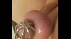 Close up pussy hole and cock cage Thumb